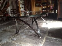 table elliptique fer forgé et verre trempé.